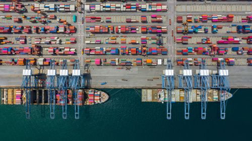 aerial-view-cargo-ship-terminal-unloading-crane-cargo-ship-terminal